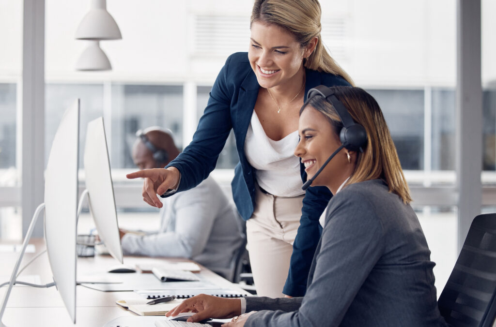 A contact center manager helping an agent improve