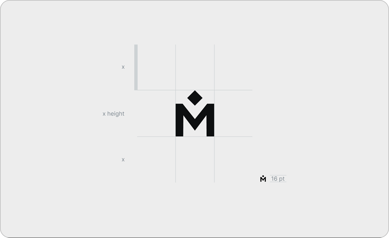 A minimalist black M logo with a diamond shape above it is centered on a white background with light gray grid lines and measurements illustrating the logos proportions and spacing.