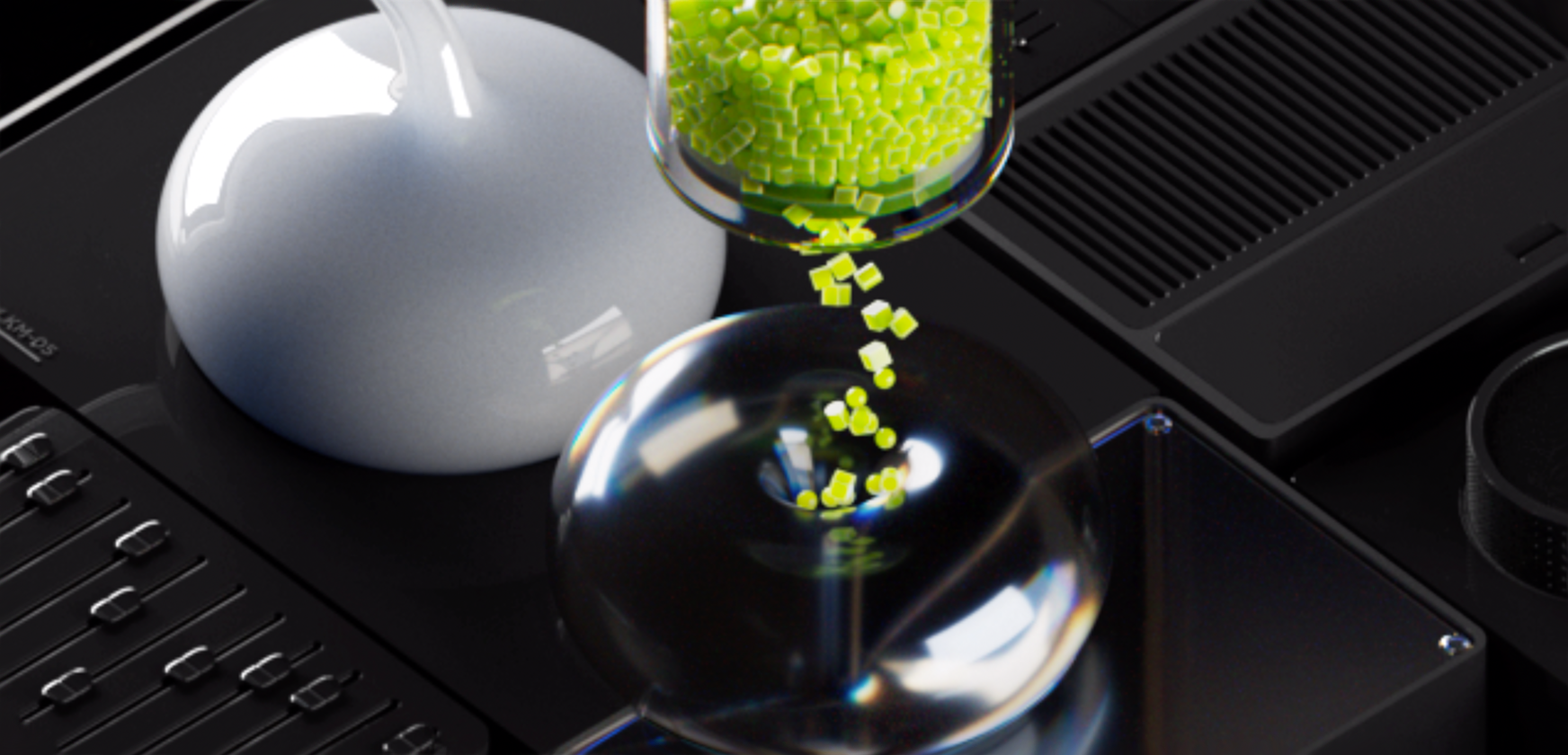 A close-up of small green cubes being dispensed from a transparent container into a shiny, reflective bowl, surrounded by dark, modern laboratory equipment.