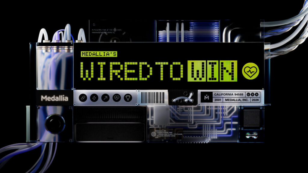A futuristic electronic device displays “Medallia’s Wired to Win” in green digital text, with cables connected and a heart icon on the right.