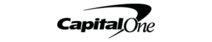 Capital One logo with the company name in black text and a swoosh design curving over the word One, all on a light gray background.